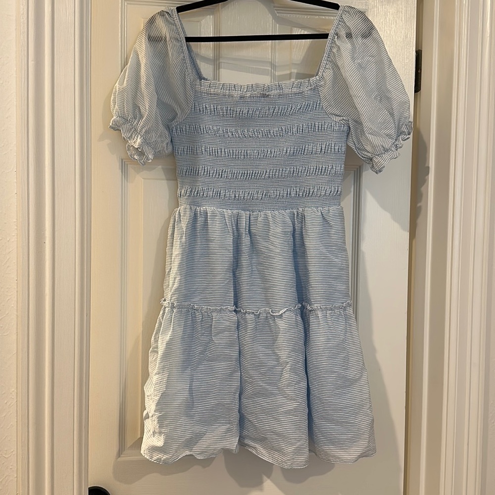 Baby blue mini dress with puff sleeves. Size large.